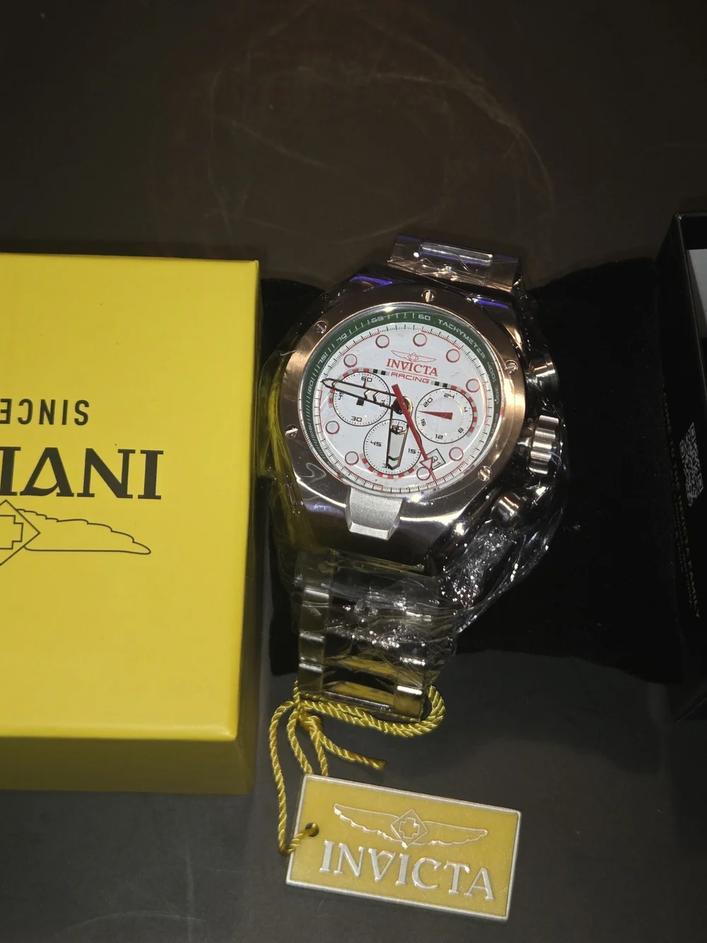 Invicta Men’s Silver-Tone Chronograph Watch with White Dial and Red Accents